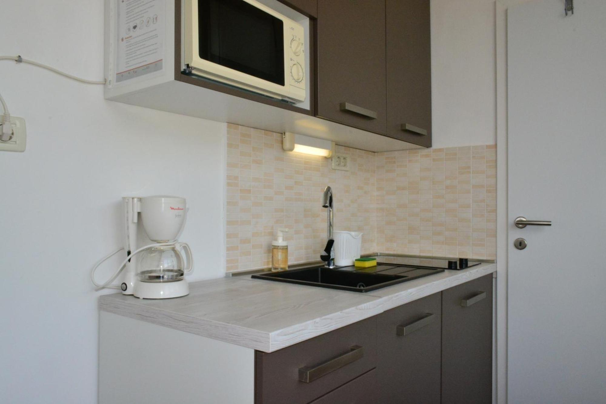 Apartments Zigulic โอปาติยา ภายนอก รูปภาพ